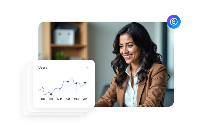 businesswoman smiling while reviewing user growth analytics displayed beside her