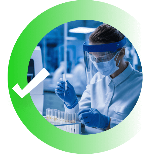 Scientist testing samples in a blue lit lab